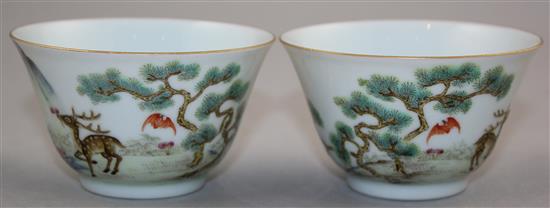 A pair of Chinese famille rose cups, 8cm diam.